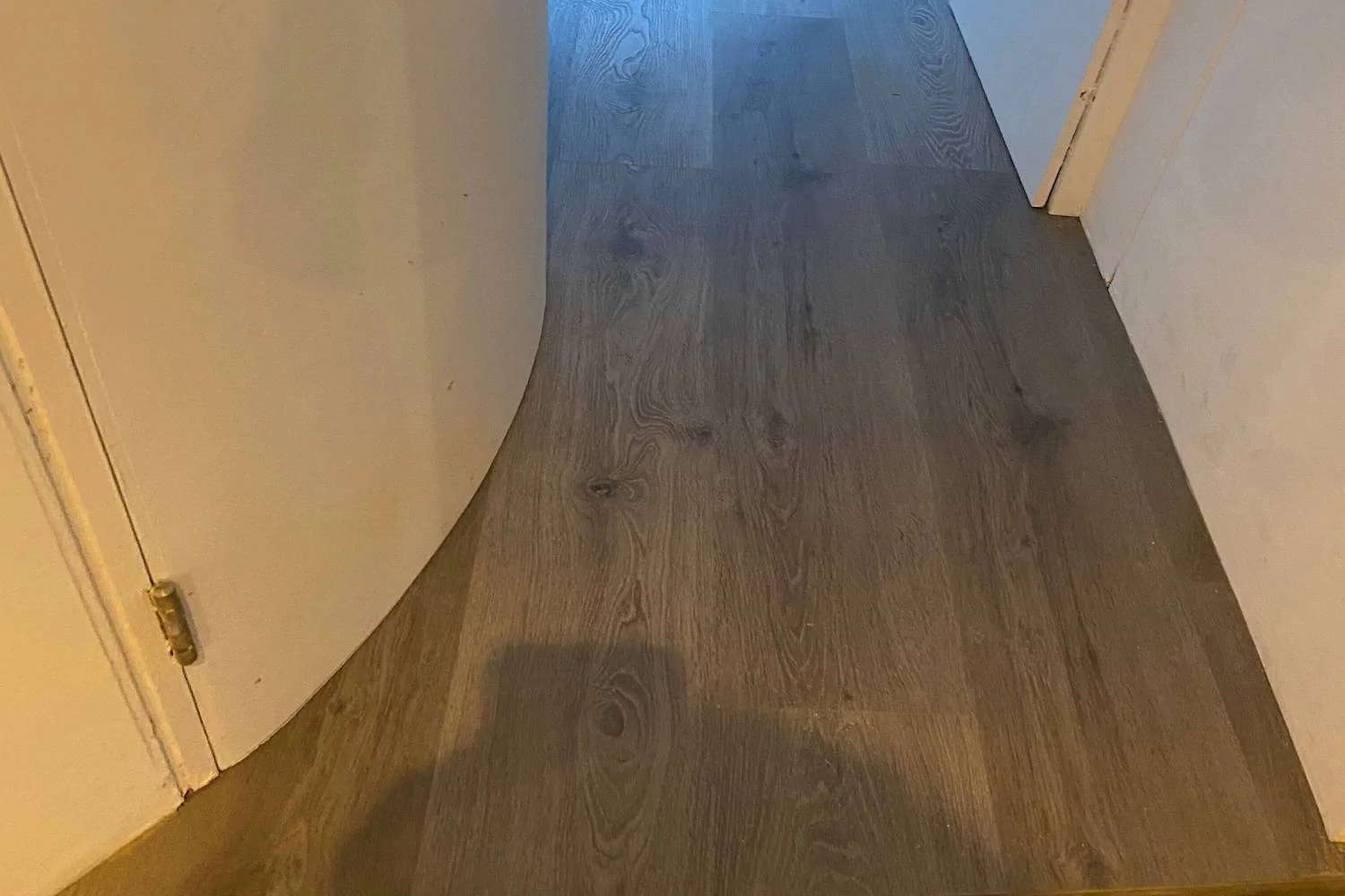 Impervia French Grey Luxury Flooring push fit cutting around corners