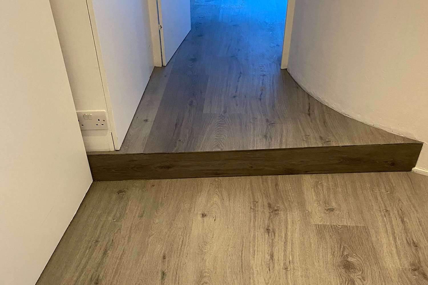 Impervia French Grey Luxury Flooring push fit with a step made from it