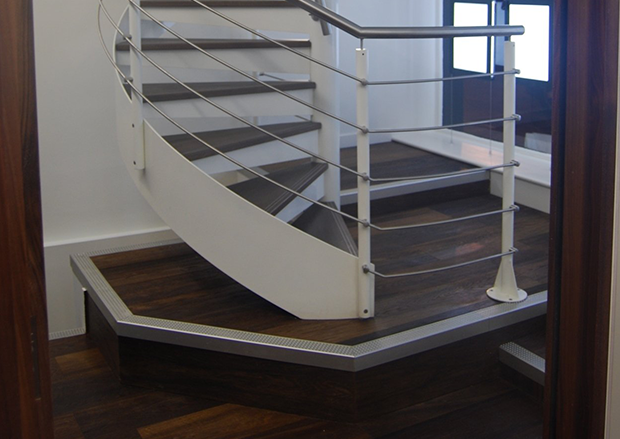 Cladding Stairs with Fumed Oak & Metal Inserts