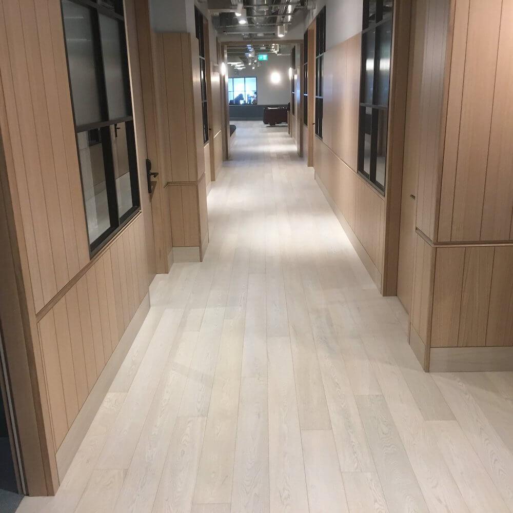 Snow White Engineered Wood Flooring for The Office Group in Thomas House Victoria London