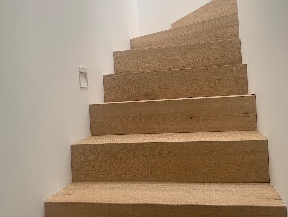 Cladding Winding Stair Case with Brushed Band Sawn Oak