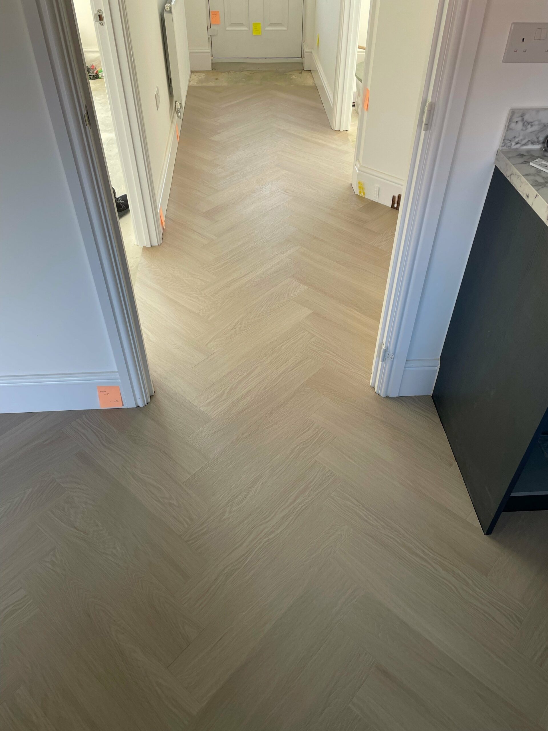 Alabaster White Oak Impervia Herringbone Parquet