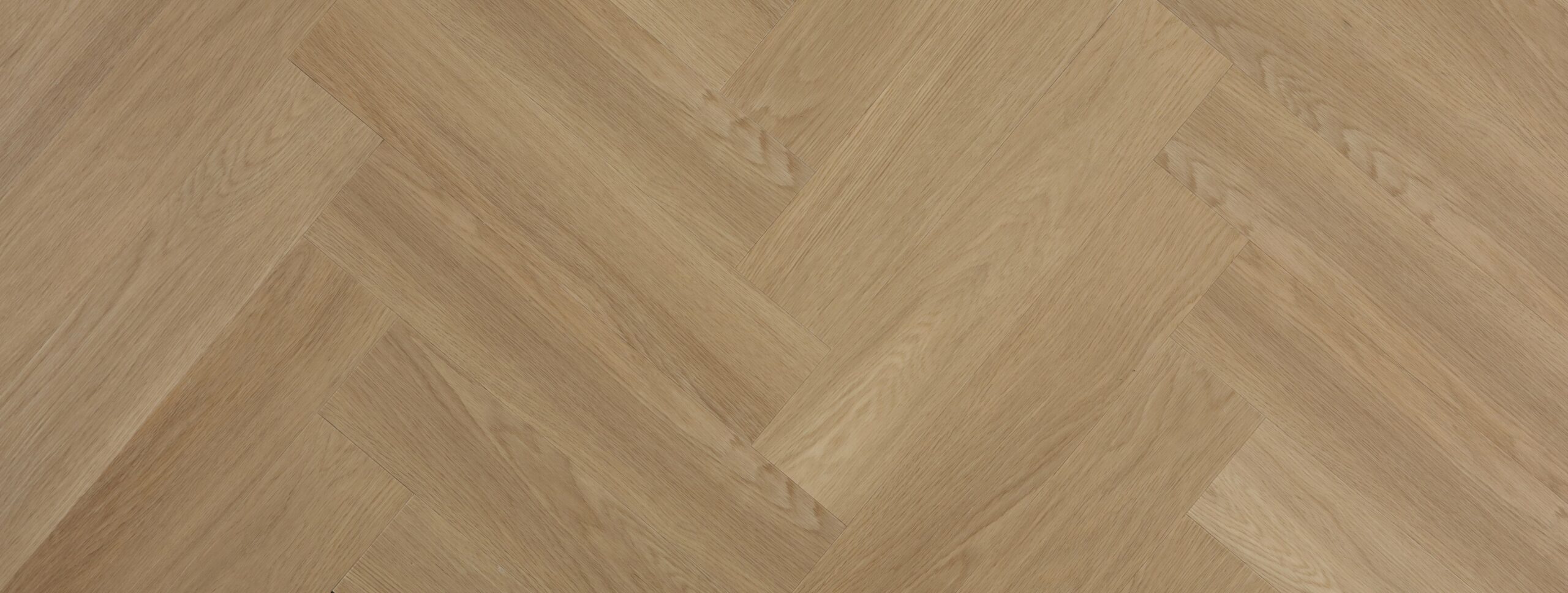 Champagne Oak Impervia Herringbone Parquet