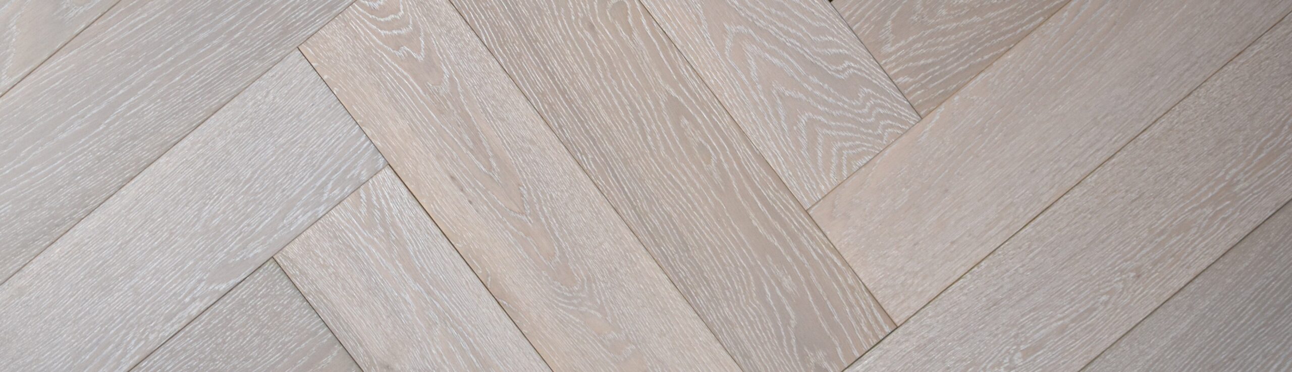 Brushed Dove Grey UV Oiled Oak Herringbone Parquet