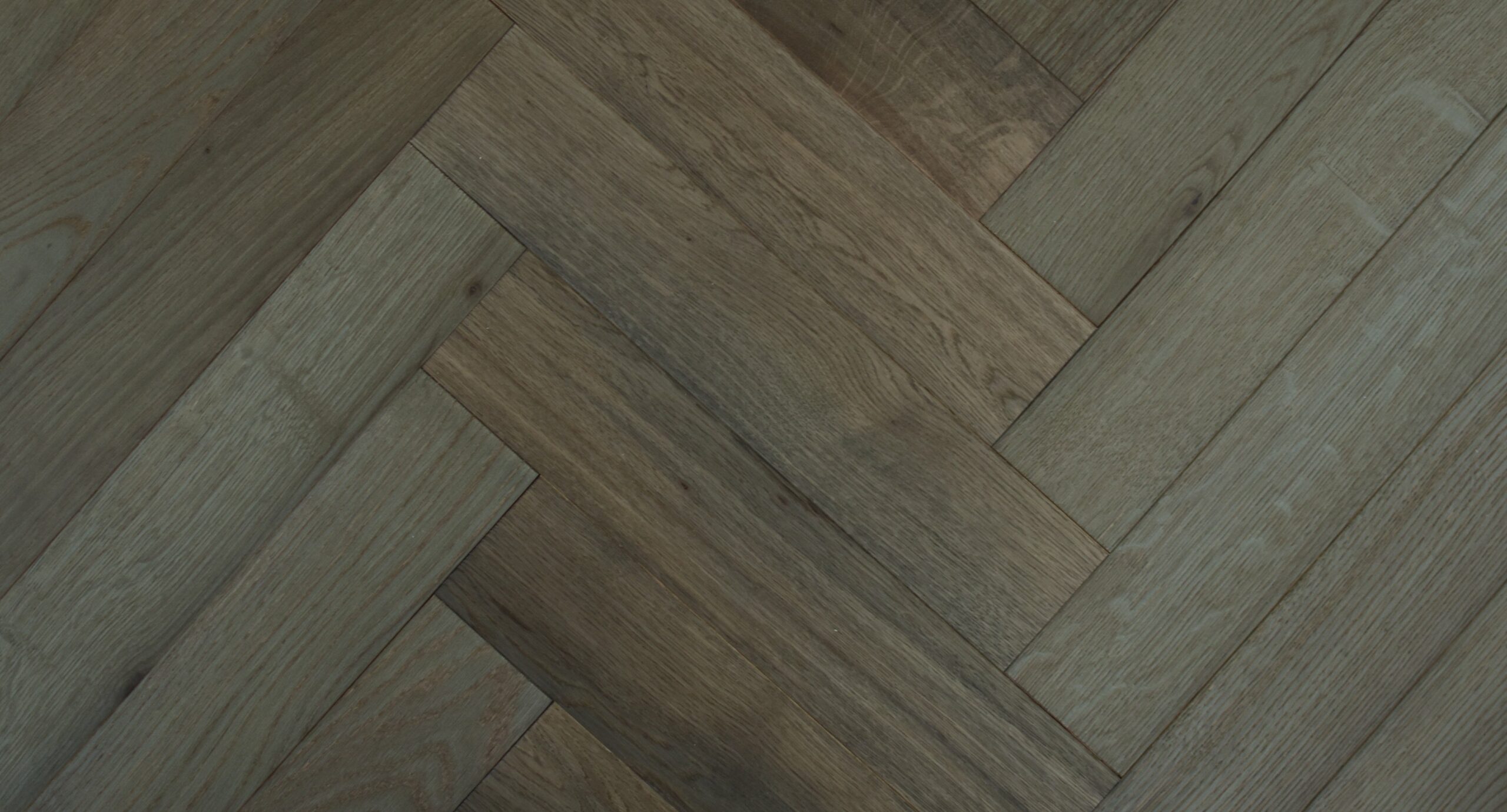 Brushed Fumed Volcanic Grey UV Oiled Oak Herringbone Parquet